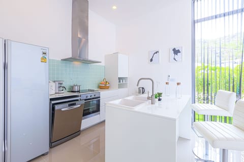 Villa | Private kitchen | Full-size fridge, microwave, oven, stovetop