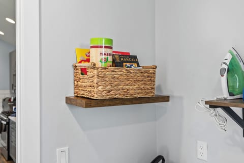 Game basket with board games, cards & coloring for kids & adults.