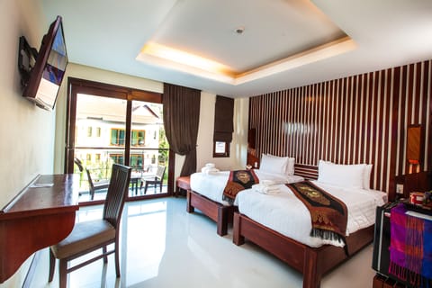 Deluxe Room, Pool View | In-room safe, desk, free WiFi, bed sheets