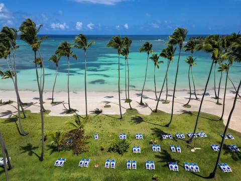 On the beach, sun loungers, beach towels