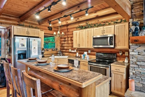 A stocked kitchen with breakfast island