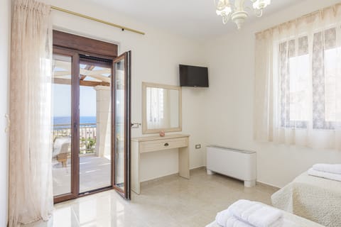 The twin bedroom also has access to the balcony.