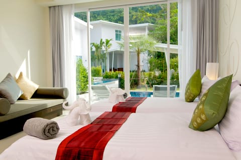 Deluxe Room, Pool Access | Minibar, in-room safe, desk, free WiFi