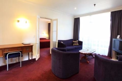 Suite | Living room | Flat-screen TV, DVD player