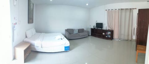 Exclusive Room, 1 King Bed, Resort View, Ground Floor | 1 bedroom, free WiFi, bed sheets