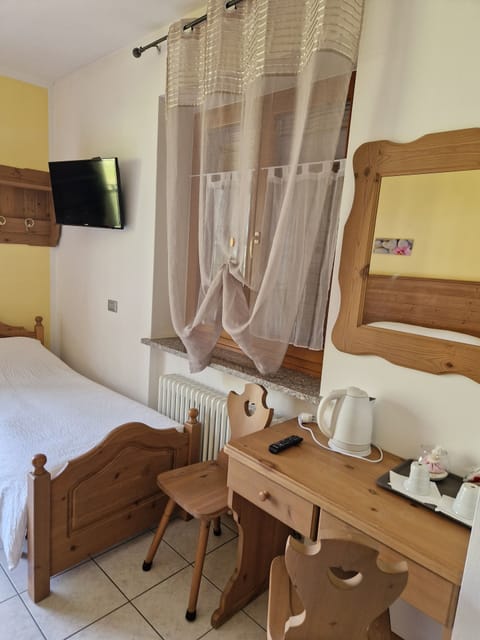 Premium bedding, down comforters, memory foam beds, desk