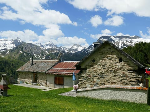 Cloud, Sky, Mountain, Building, Nature, Natural Landscape, Highland, Plant, House, Snow