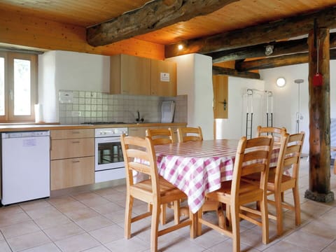 Furniture, Countertop, Property, Cabinetry, Building, Chair, Wood, Kitchen Appliance, Kitchen Stove, Table