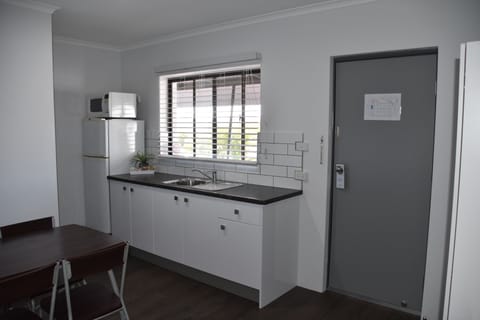 Family Apartment, 2 Bedrooms | Private kitchenette | Fridge, microwave, coffee/tea maker