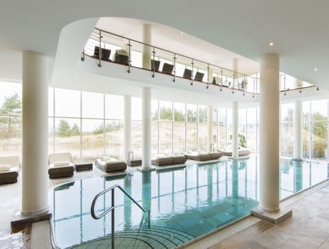 Indoor pool, open 7 AM to 9 PM, sun loungers