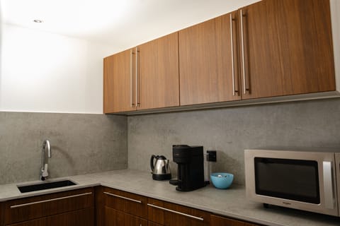 Suite, 1 King Bed (Riverside) | Private kitchen | Electric kettle, dining tables