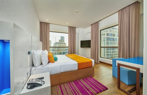 Apartment, 2 Bedrooms, City View (1 King Bed, 1 Twin Bed) | Down comforters, minibar, in-room safe, individually decorated