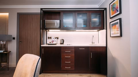 Suite, 1 Bedroom | In-room safe, desk, iron/ironing board, free WiFi