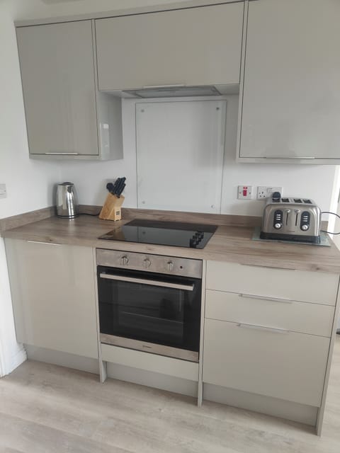 cooking area gas oven electric hob and extractor fan