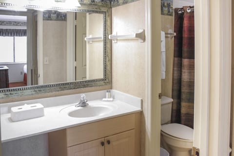Condo, 2 Bedrooms, Kitchen | Bathroom | Combined shower/tub, deep soaking tub, free toiletries, hair dryer