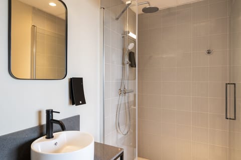 Shower, rainfall showerhead, hair dryer, heated floors