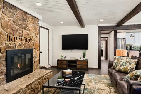 Living Room with tv, fireplace, sofa, chairs (main level)