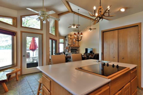 House, Multiple Beds, Jetted Tub (Cheif Lake Lodge) | Private kitchen | Fridge, microwave, oven, stovetop