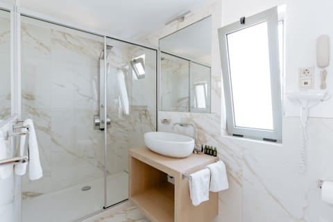 Panoramic Studio Suite, Terrace, Sea View | Bathroom | Shower, free toiletries, hair dryer, slippers