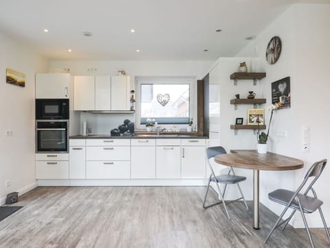 Furniture, Cabinetry, Countertop, Wood, Flooring, Interior Design, Kitchen, Floor, Material Property