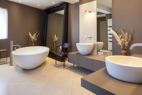 Family Suite | Bathroom | Designer toiletries, hair dryer, bathrobes, slippers