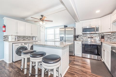 Kitchen area with washer and dryer for your use