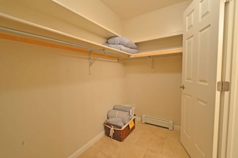 The large master closet has plenty of space and holds the sleeper bedding.