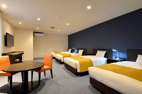 Deluxe Fourth Non-smoking (Cleaning is Optional with Additional Cost) | In-room safe, desk, free WiFi, bed sheets