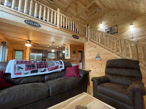 Spacious and comfortable living area is the gathering place for this beautiful cabin