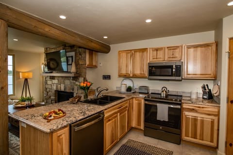 Open kitchen design provides a stunning view of Lake Hatcher.