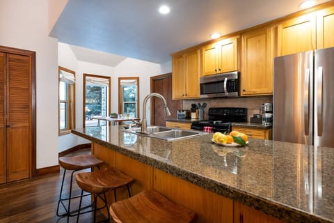 Kitchen overlooking the quiet neighborhood, newly renovated with 5 star guest reviews!
