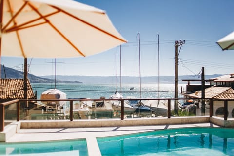 Outdoor pool, pool umbrellas, sun loungers