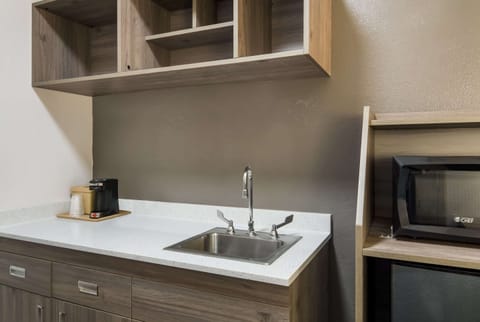 Minibar, desk, blackout drapes, iron/ironing board