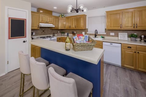 Well stocked kitchen with open floor plan