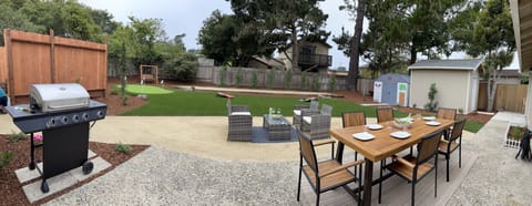 Backyard (with BBQ Grill, plenty of seating, putting green, and bocce ball)