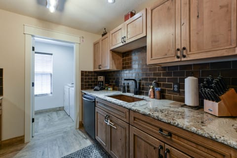 Kitchen with view into laundry room