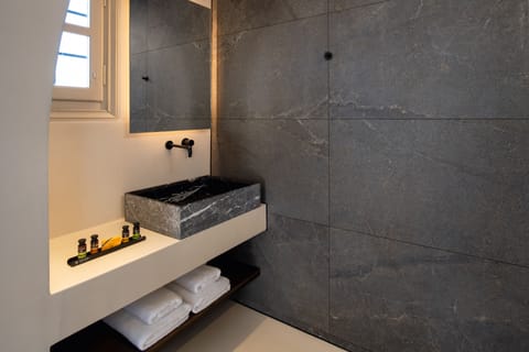 Suite, Private Pool | Bathroom | Shower, hair dryer, bathrobes, slippers