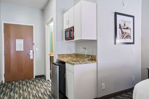 Suite, Multiple Beds, Non Smoking | Desk, blackout drapes, iron/ironing board, free cribs/infant beds