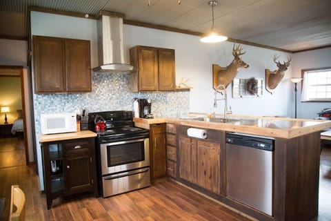 Kitchen (not pictured, full size refrigerator and table)