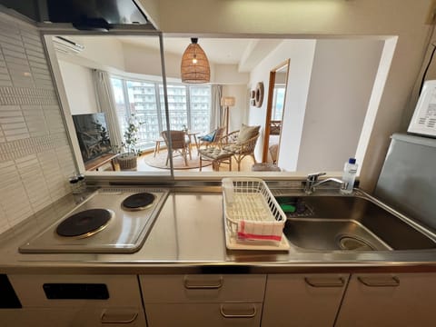 Apartment (2501) | Private kitchen | Fridge, microwave, stovetop, rice cooker