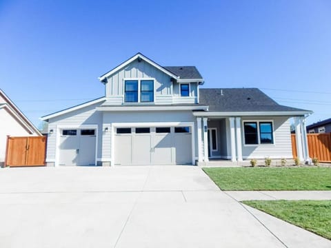 Front of house. Large concrete driveway with lots of room to park. Parking on road available too. Home built in April 2020 in a friendly neighborhood. 