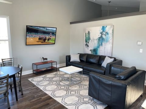 Large open living room/kitchen space for your entire group to hang