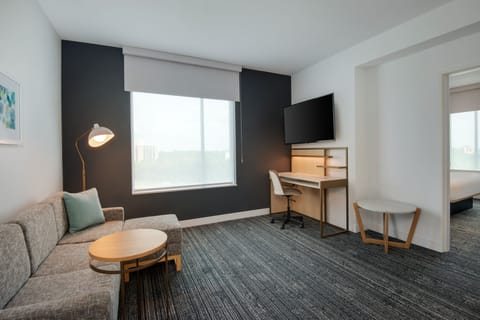 Suite, 1 Bedroom | Living room | Flat-screen TV