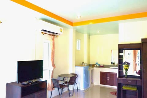 Deluxe Bungalow, 2 Twin Beds, Garden View | Living area | 29-inch LCD TV with cable channels, TV