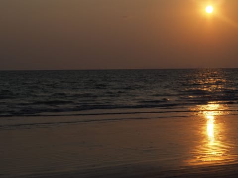 On the beach, sun loungers, beach umbrellas, beach towels