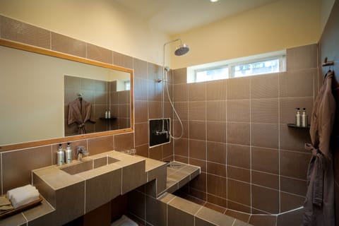Family Garden Room | Bathroom | Shower, rainfall showerhead, free toiletries, hair dryer