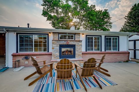 Indoor/outdoor gas fireplace and adirondack chairs, fire starts w/flip of switch