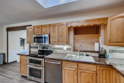 Main level kitchen, 1 of 2. Fully stocked including Keurig+coffee, blender, etc.