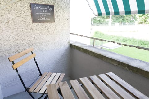 Balcony facing backyard.