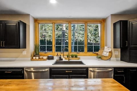 Fully-equipped kitchen with top-of-the-line stainless steel appliances and a spacious center island